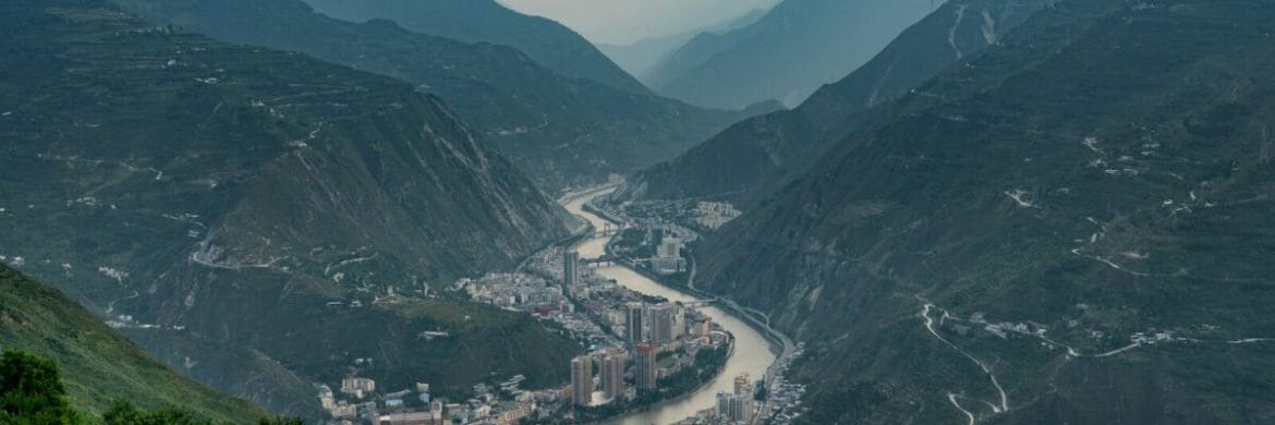 Photo by ダモ リ a city in the mountains of sichuan
